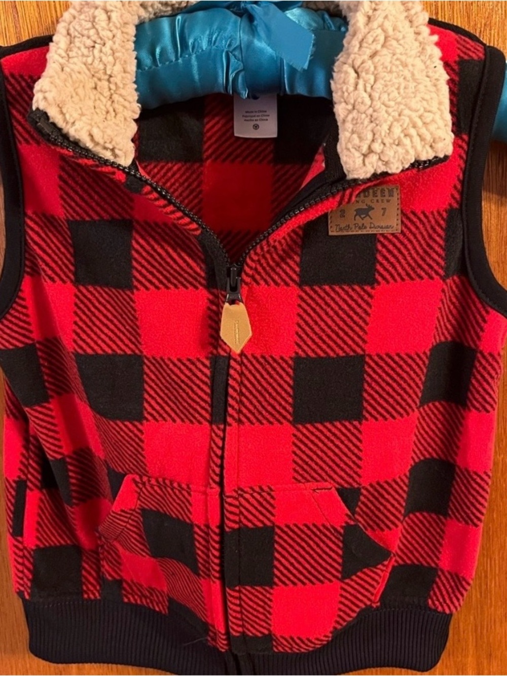 Lot of two boys vests-24M
